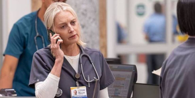 Katherine LaNasa as Dana Evans on the phone in scrubs in the ER in 'The Pitt'