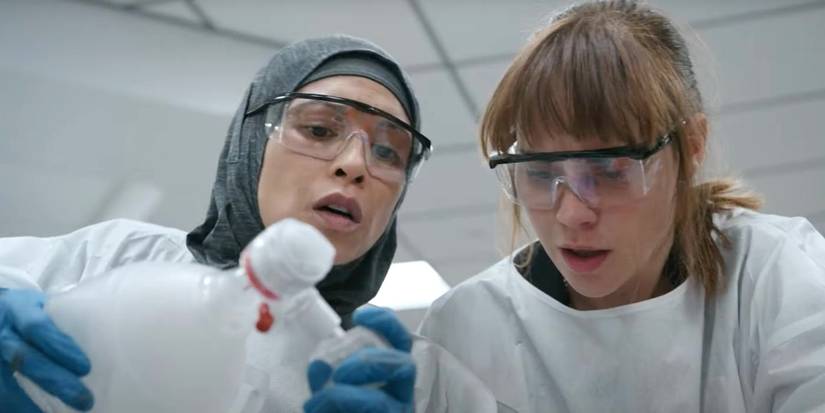 Nurse Perlah (Amielynn Abellera) helps Dr. McKay (Fiona Dourif) keep a patient alive on The Pitt.