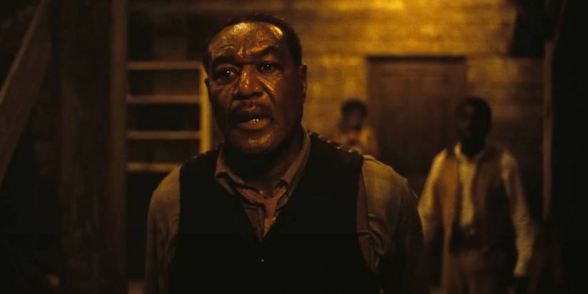 Delta Slim (Delroy Lindo) has a worried look on his face in Sinners.