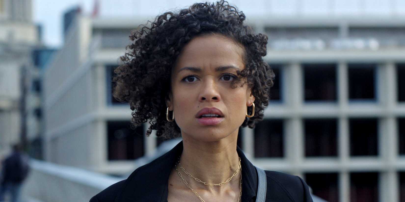 Gugu Mbatha-Raw as Sophie outside looking concerned with her hair blowing in Surface Season 2.