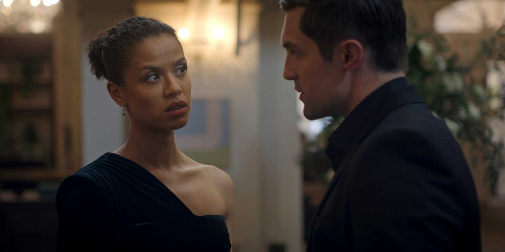 Phil Dunster as Quinn standing across from Gugu Mbatha-Raw as Sophie in Season 2 of Surface.