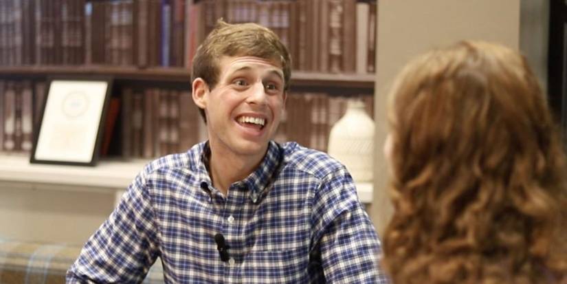 Tanner Smith smiling on Love on the Spectrum.