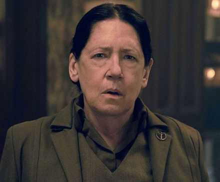 Ann Dowd as Aunt Lydia looking on with a shocked expression in a still from 'The Handmaid's Tale.'