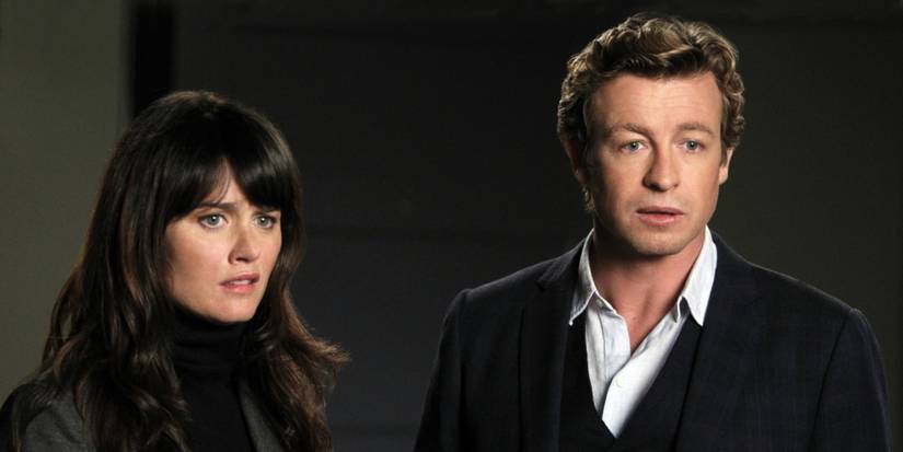 Simon Baker as Patrick Jane and Robin Tunney as Lisbon looking concerned in The Mentalist.