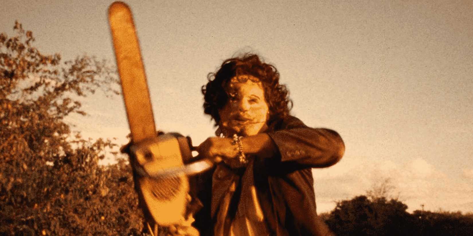Gunnar Hansen as Leatherface wielding his chainsaw in The Texas Chain Saw Massacre