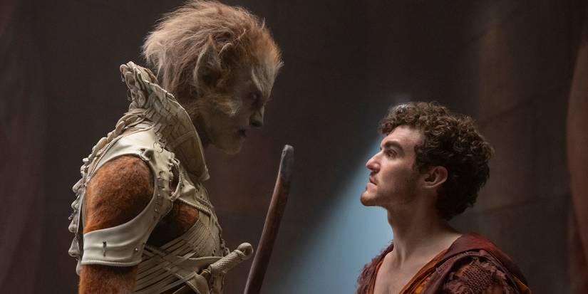 Robert Strange looming over Donal Finn in The Wheel of Time Season 3