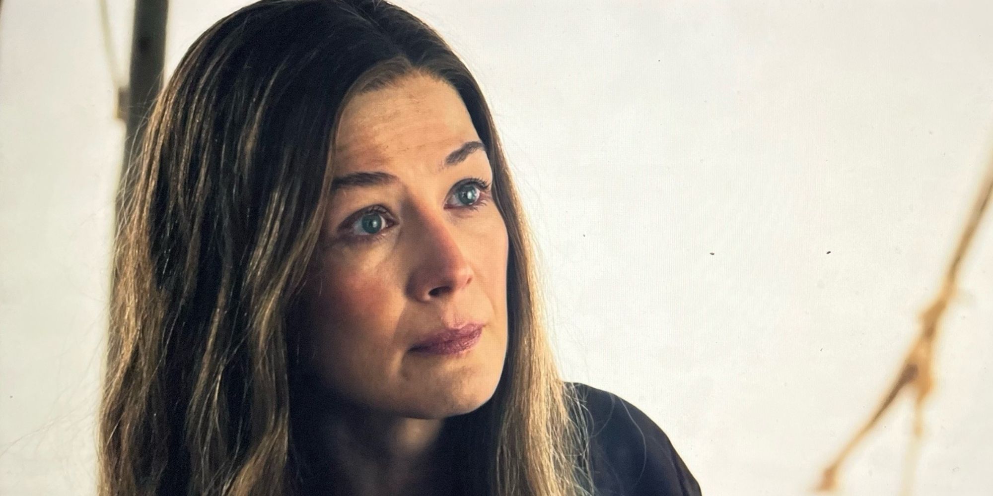 Moiraine (Rosamund Pike) looks serious in a tent in The Wheel of Time Season 3 finale
