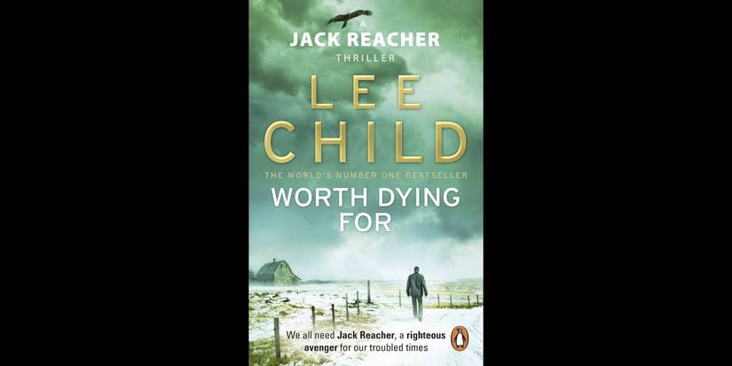 A figure on a lonely road with a barn in the distance on the book cover for Worth Dying For by Lee Child.