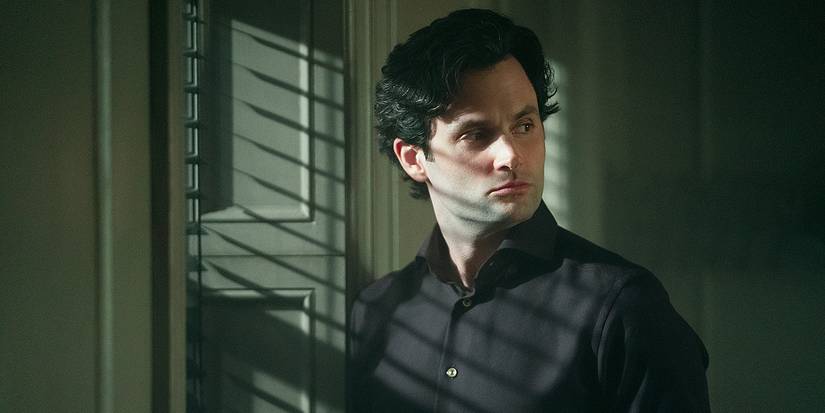 Penn Badgley as Joe looking to the side in You Season 5.