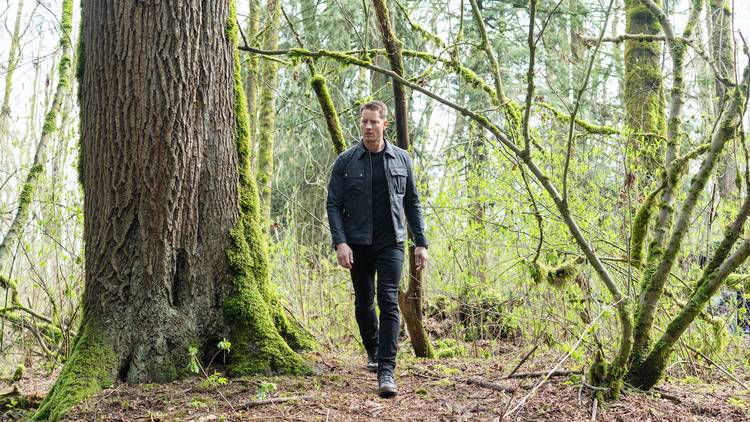Colter Shaw (Justin Hartley) wanders the woods in the 'Tracker' Season 2 finale "Echo Ridge"
