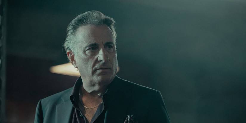 Andy Garcia as Galino, frowning while looking at someone off-screen in Landman.