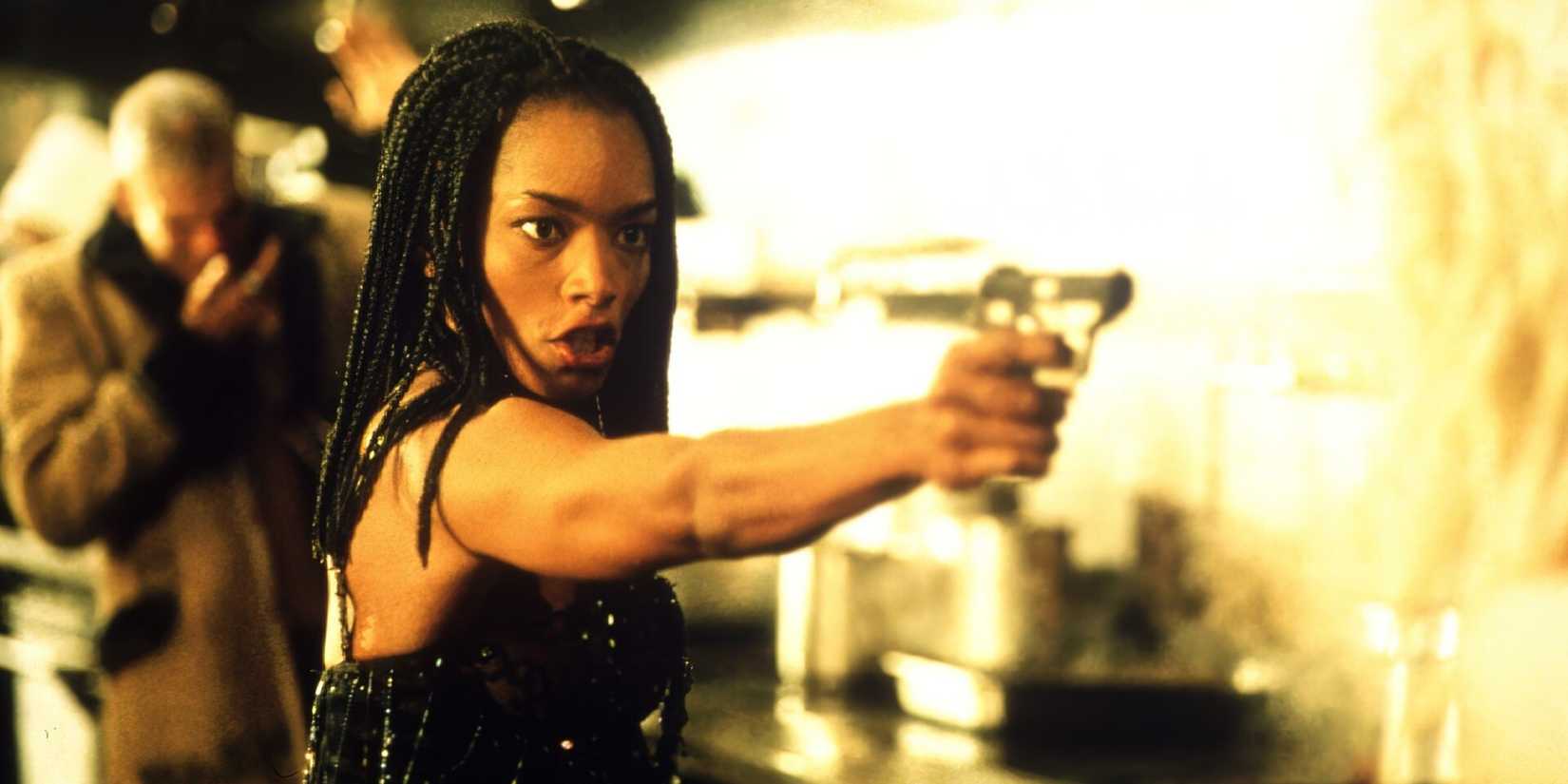 Angela Davis aims a handgun in Kathryn Bigelow's 'Strange Days