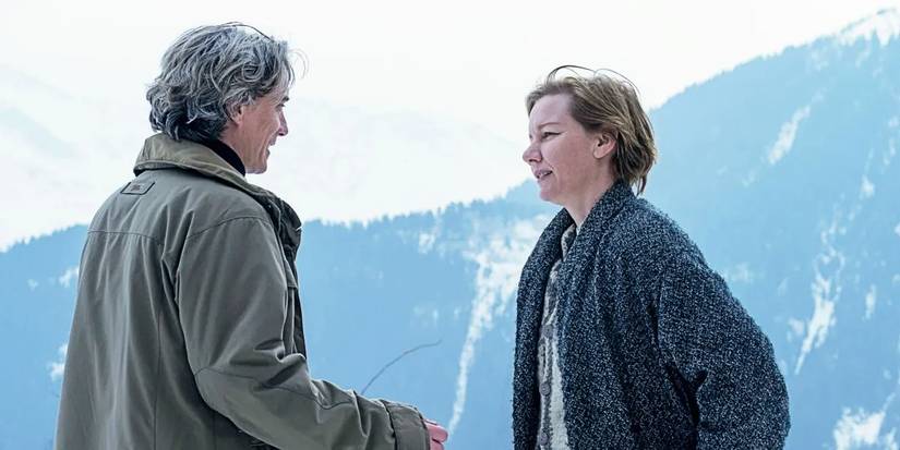 Sandra Voyter and Vincent Renzi standing and facing each other in Anatomy of a Fall