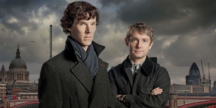 Benedict Cumberbatch and Martin Freeman as Sherlock Holmes and Dr. Watson look ahead with a city backdrop.