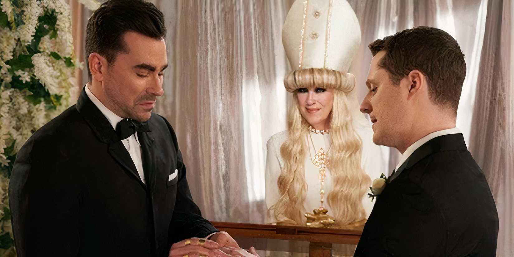 Catherine O'Hara officiates Noah Reid and Dan Levy's characters wedding in Schitt's Creek, Happy Ending.