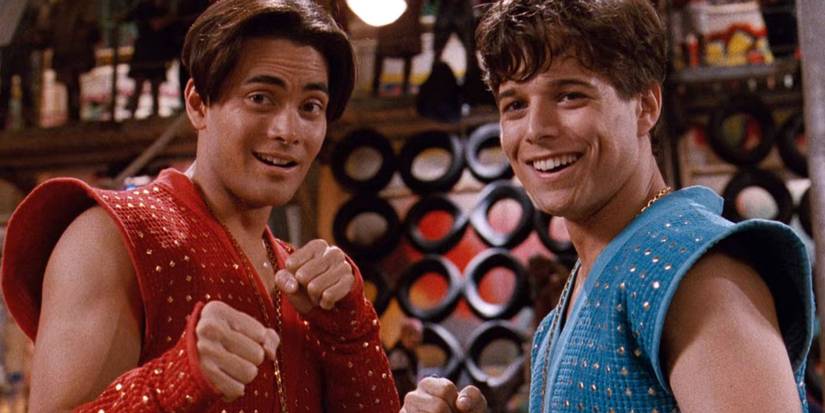 Mark Dacascos and Scott Wolf as Jimmy and Billy Lee laughing together in Double Dragon.