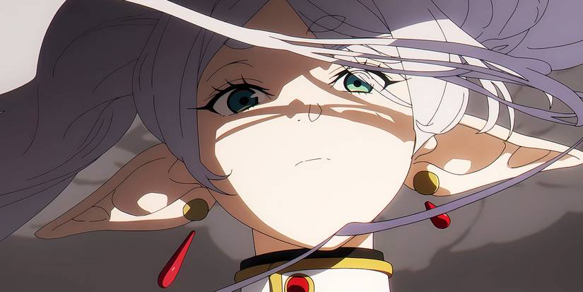 A female character looking down at the camera in Frieren