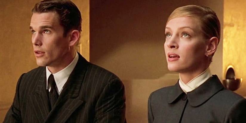 Ethan Hawke and Uma Thurman looking up in Gattaca