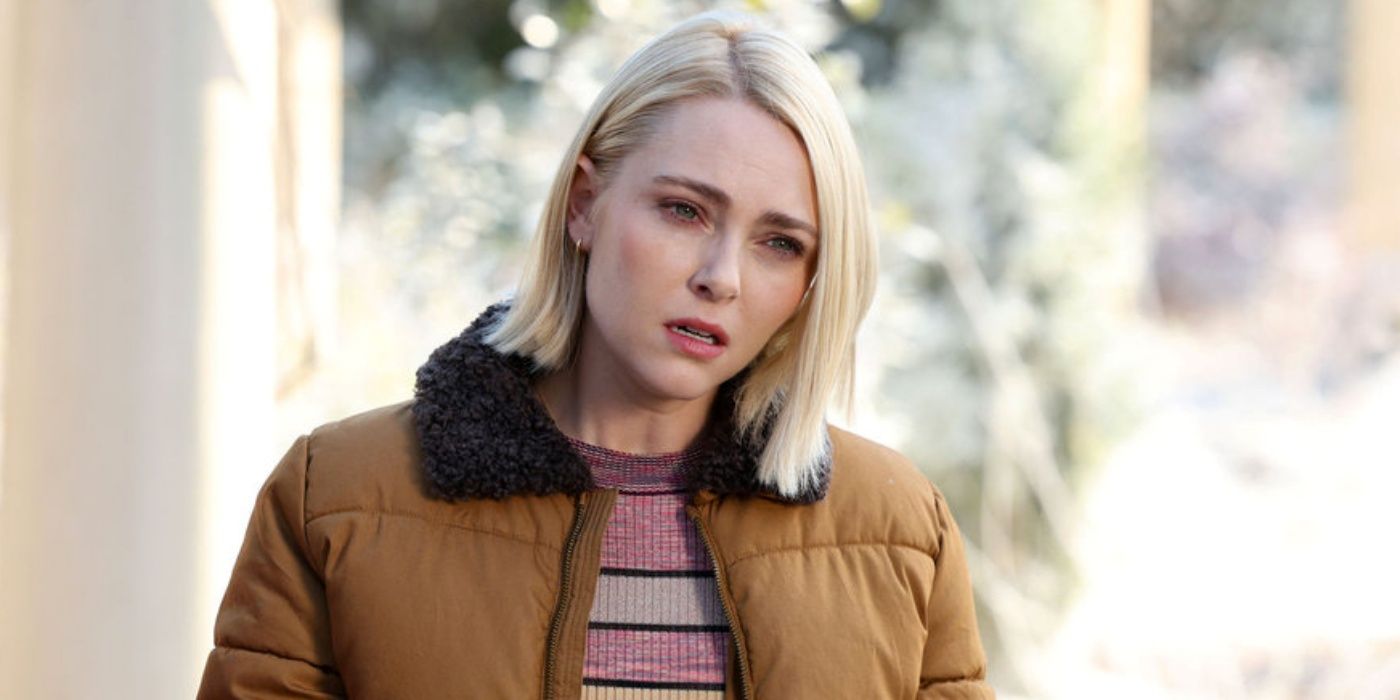 AnnaSophia Robb as Alice in a puffy coat and furry collar looking concerned in Grosse Pointe Garden Society