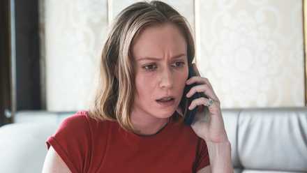 Hannah Einbinder's Ava Daniels talking on the phone with a furrowed brow in the Season 4 finale of Hacks.