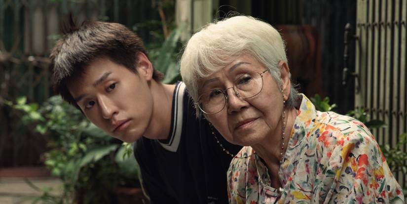 A young boy and an older woman in How to Make Millions Before Grandma Dies