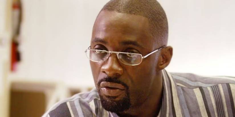 Idris Elba as Stringer Bell wearing glasses in The Wire.