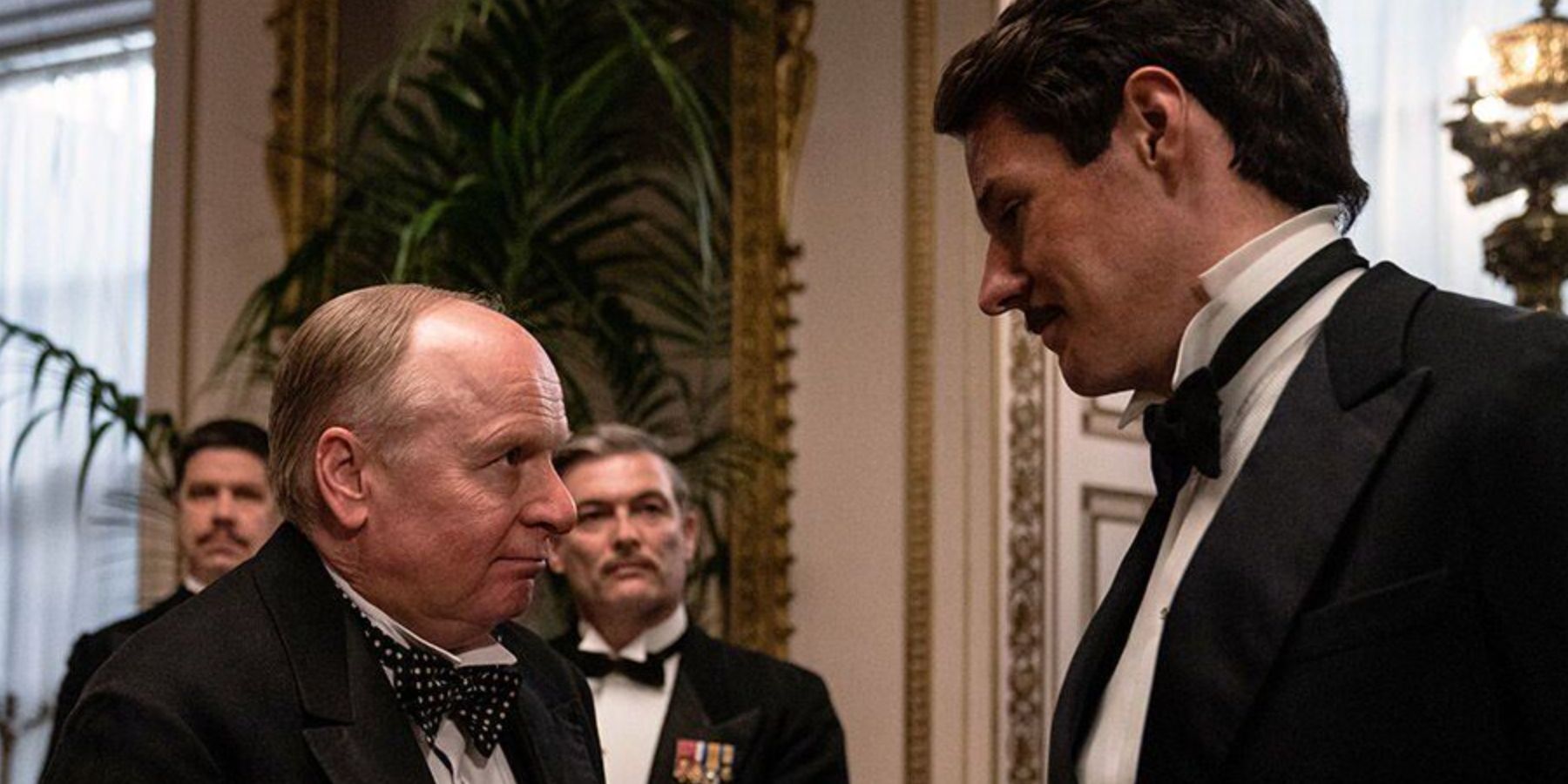 Jason Watkins as Winston Churchill shaking hands in SAS Rogue Heroes