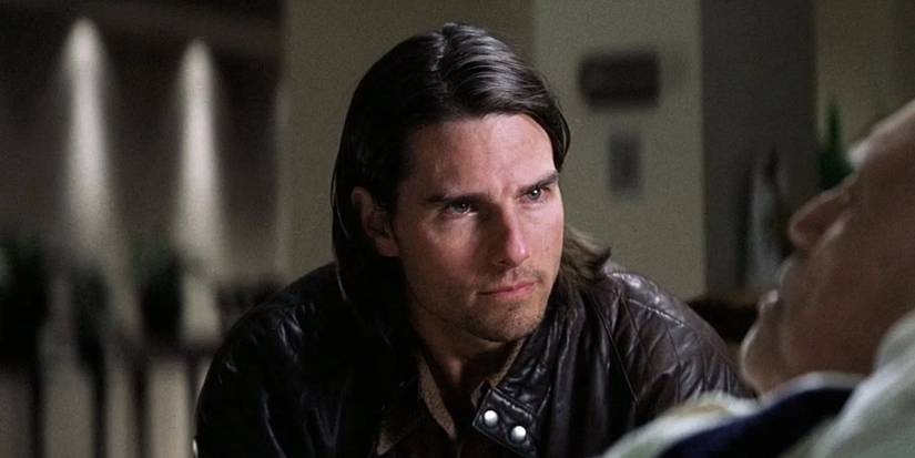 Tom Cruise as Frank T.J. Mackey looking intently ahead in Magnolia