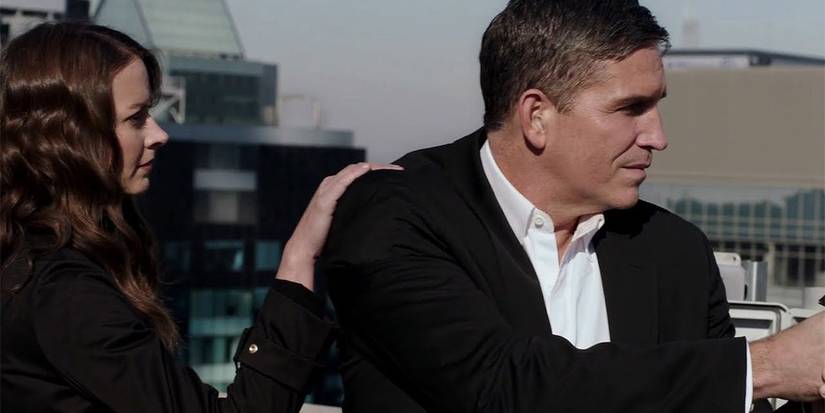 Root (Amy Acker) lays a hand on Reese's (Jim Caveziel) shoulder in Person of Interest 'Return 0'.