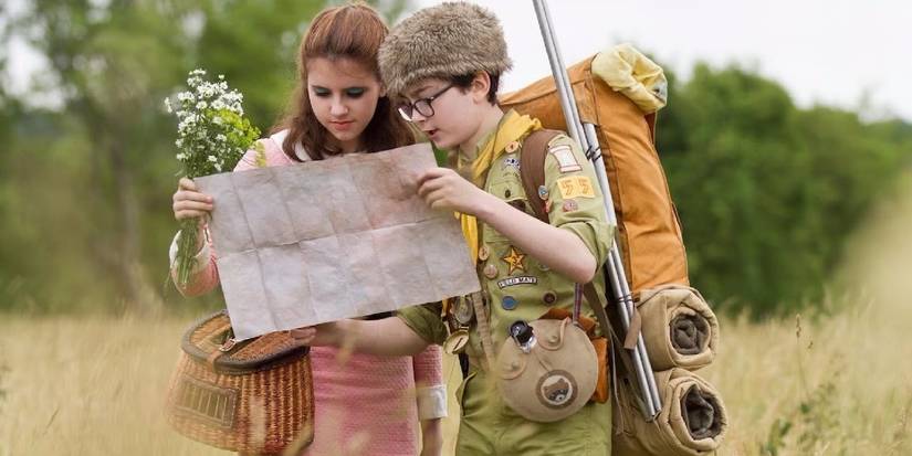 Sam Shakusky and Suzy Bishop look at a map in 'Moonrise Kingdom'.
