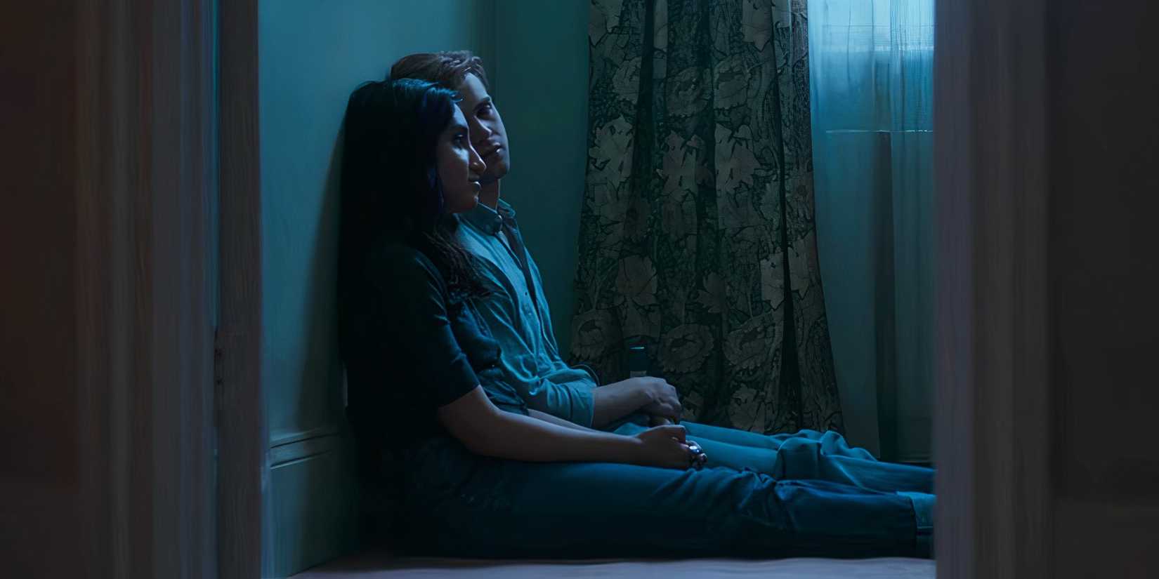 Dexter sitting with a vision of Emma in the finale One Day.