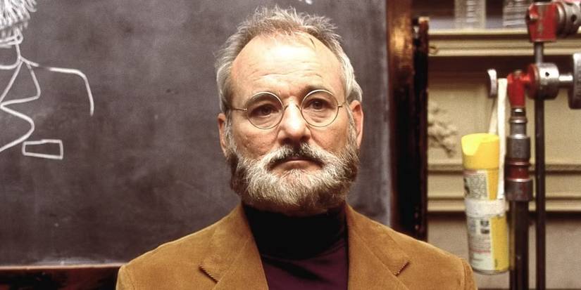 Raleigh St. Clair stands in front of a chalkboard in The Royal Tenenbaums.