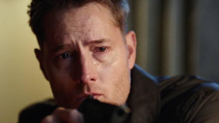 Justin Hartley as Colter Shaw, tearfully holding a gun on 'Tracker'