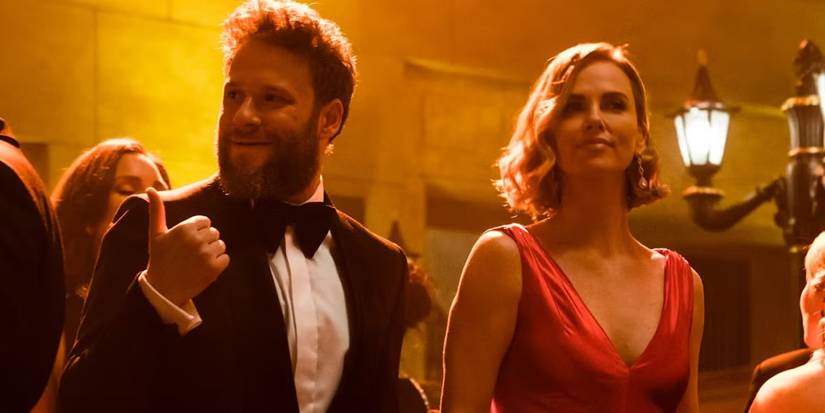 Seth Rogen and Charlize Theron in fancy clothes in Long Shot (2019).