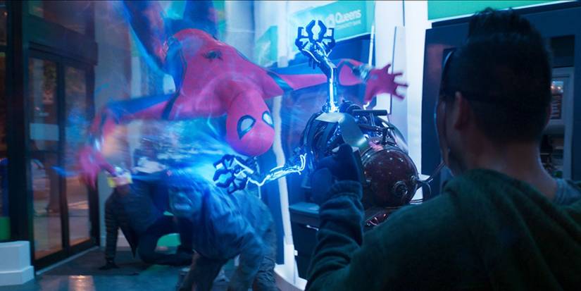 Spider-Man being held in the air with an energy gun in Spider-Man: Homecoming