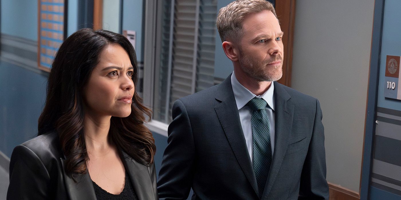 Alyssa Diaz as Angela and Shawn Ashmore as Wesley standing next to each other in The Rookie Season 7 finale.
