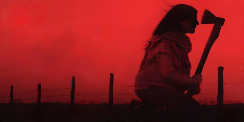 A woman is on her knees holding an axe in When Evil Lurks.