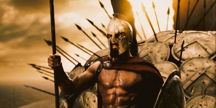 Gerard Butler as King Leonidas holding a spear in front of his army in 300