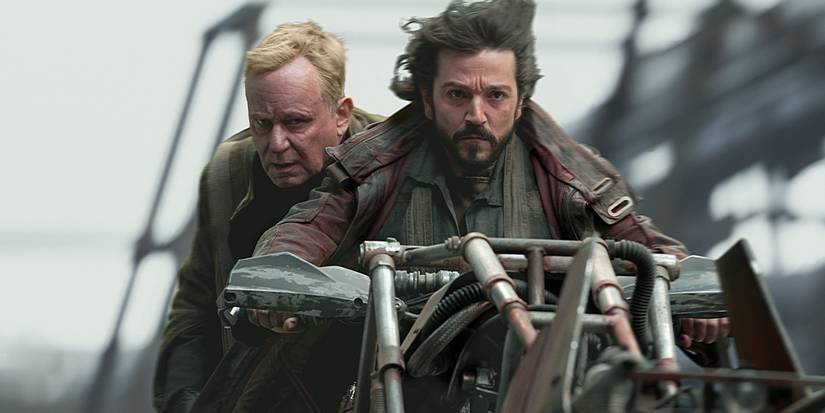 Luthen Rael and Cassian Andorin ride a motorbike in Andor.