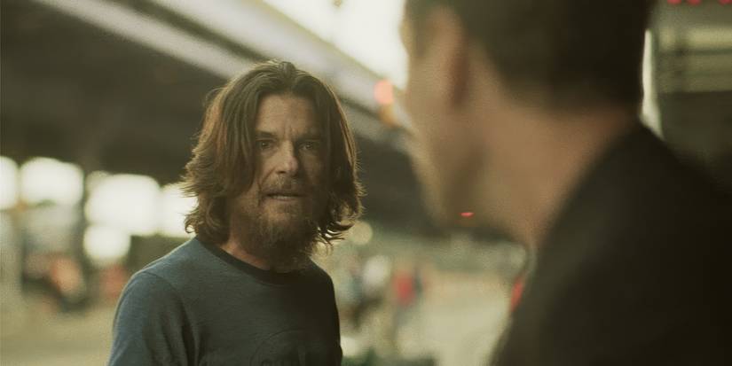 Jason Bateman and Jude Law having a discussion outside in a city in Black Rabbit.