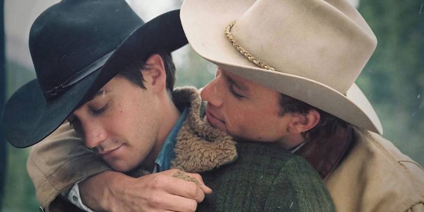 Heath Ledger embracing Jake Gyllenhaal from behind in 'Brokeback Mountain'.
