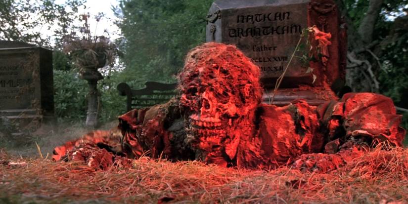 A corpse crawls out of a grave in the "Father's Day" segment of Creepshow.