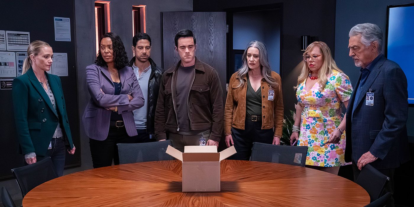 The cast of the BAU  stare at an open box on a table in Criminal Minds: Evolution