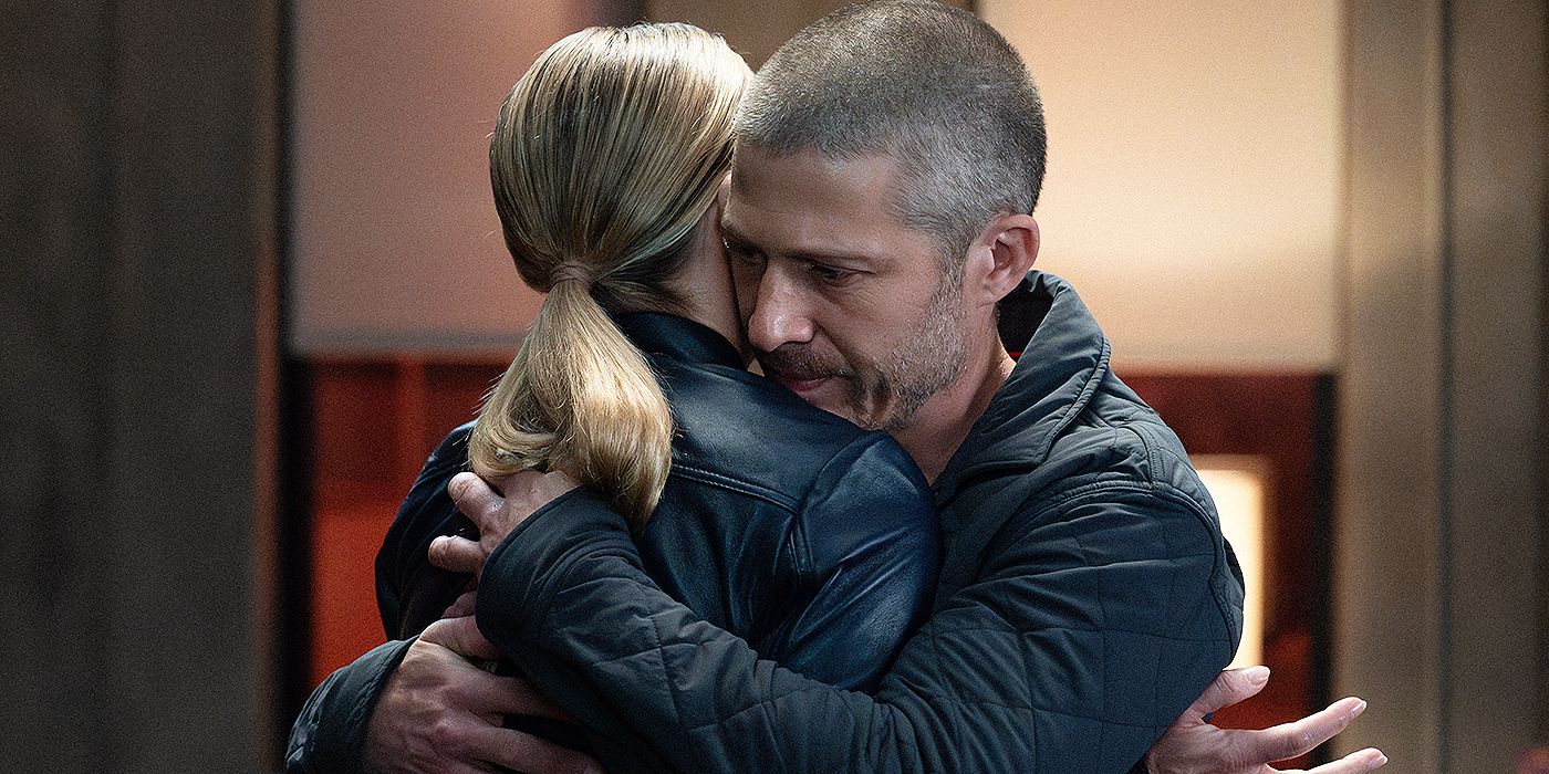 Voit (Zach Gilford) hugs J.J. (A.J. Cook) in Criminal Minds