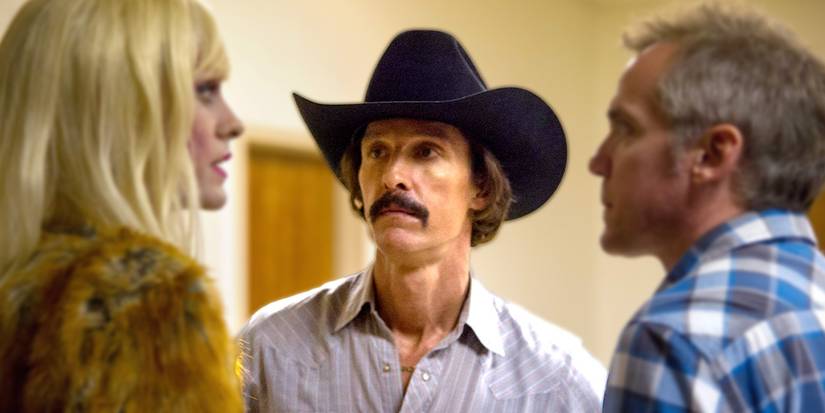 Dallas Buyers Club Matthew McConaughey listens to a couple talk while wearing a cowboy hat