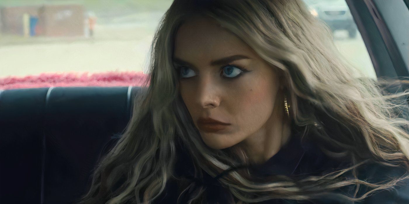 Samara Weaving looks in the rearview mirror