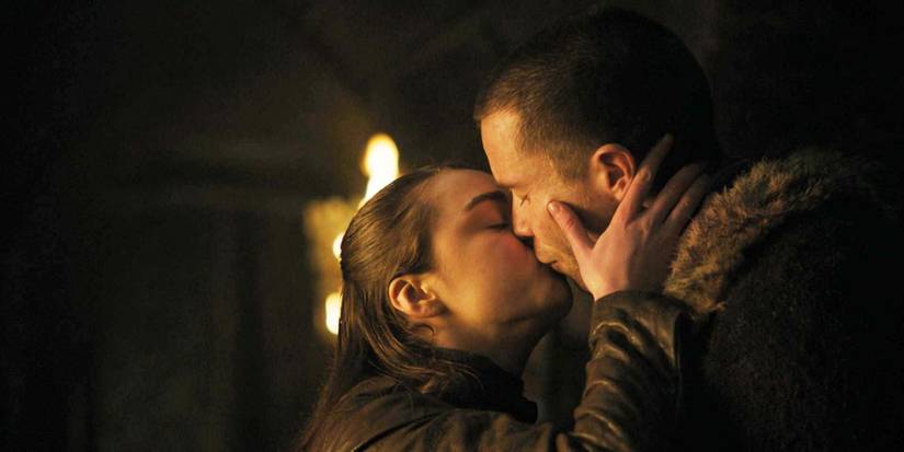Arya Stark kisses Gendry Waters/Baratheon in Game of Thrones.