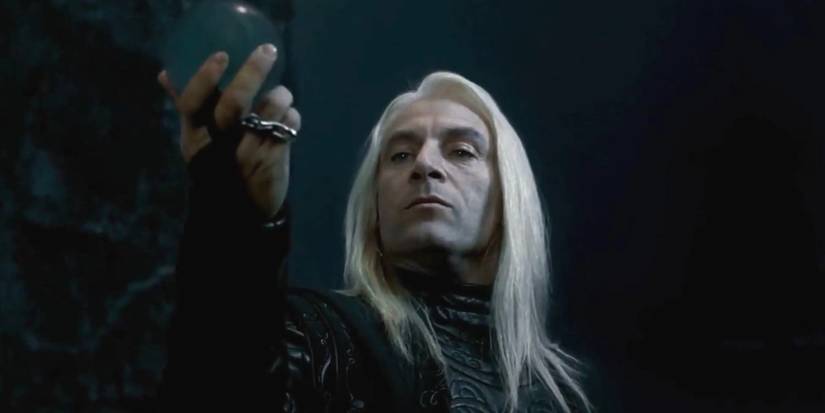 Jason Isaacs as Lucius Malfoy holding the prophecy in Harry Potter and the Order of the Phoenix