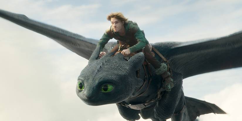 Hiccup flying on the back of Toothless