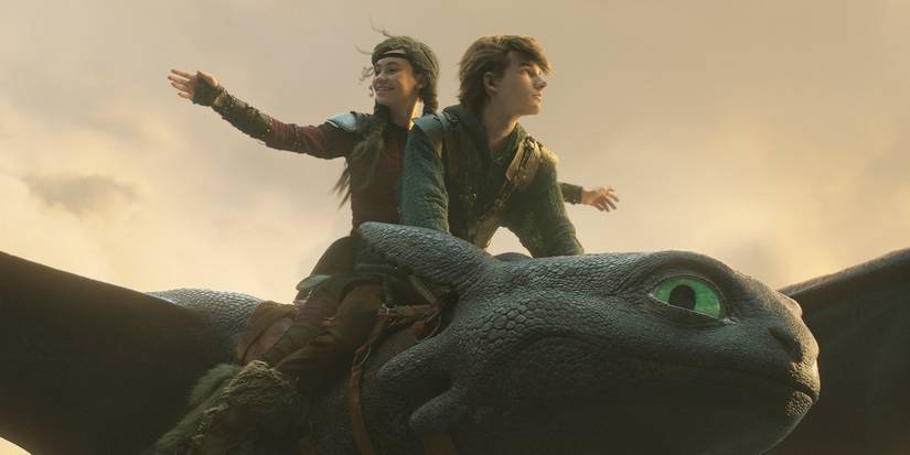 Astrid and Hiccup flying on the back of Toothless